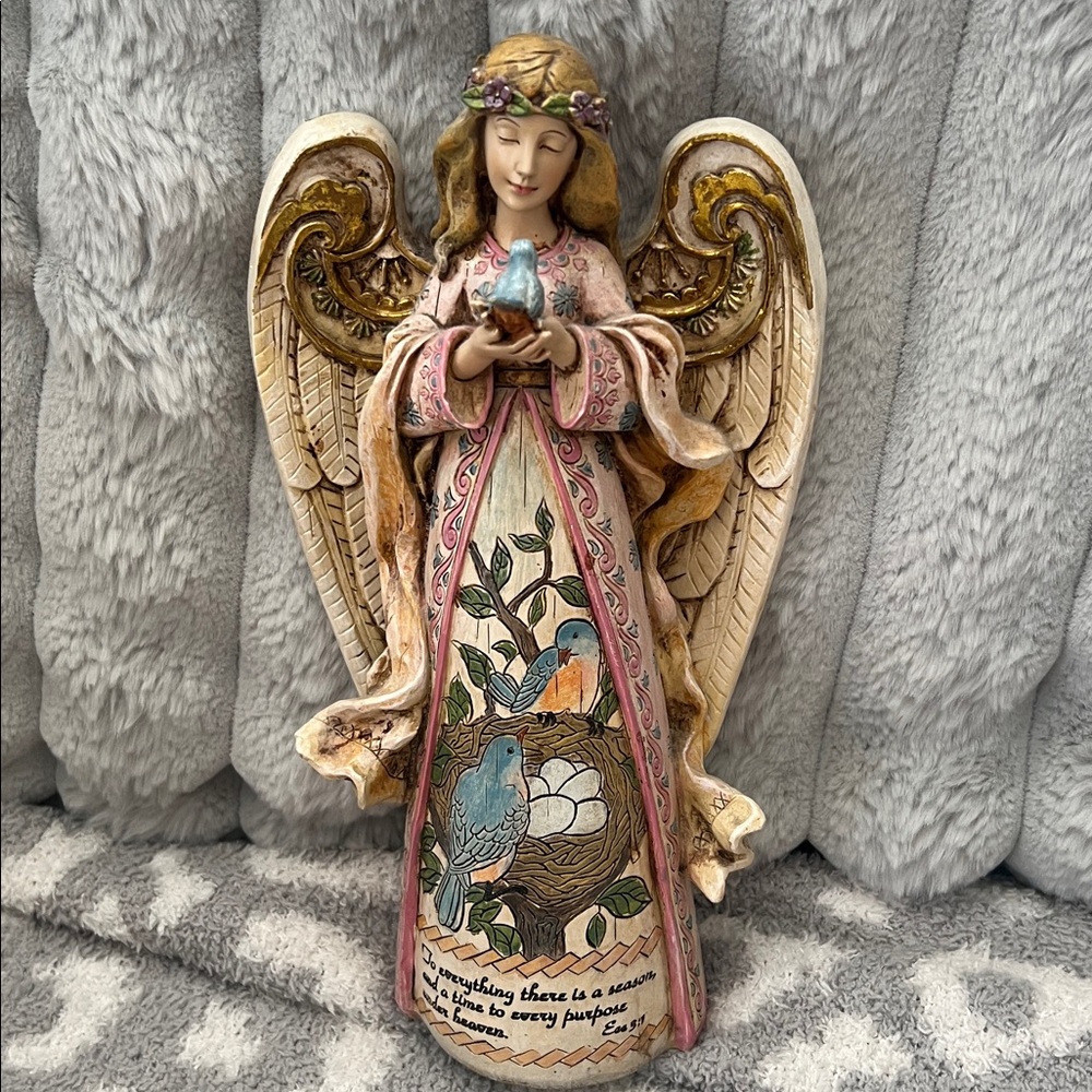 Roman Inc. Angel holding bluebird To Everything there is a season